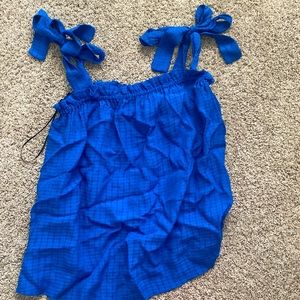 Blue tank top with tied straps